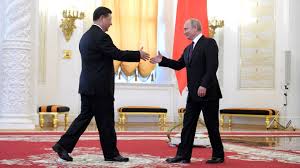 Xi invites Putin to visit China